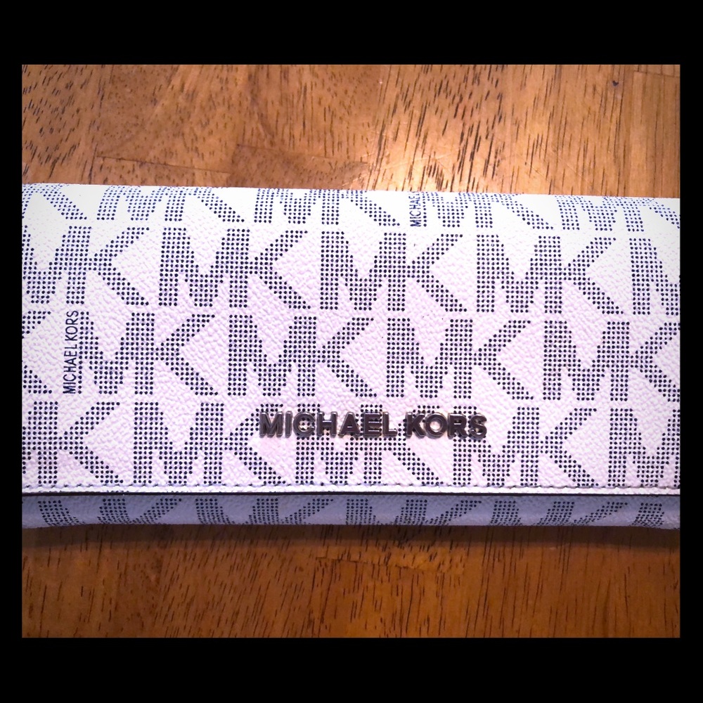 Authentic Michael Kors Navy signature wallet